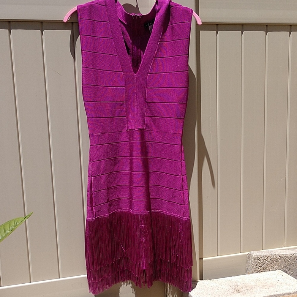 Magenta purplish Slimming fringe dress. NWOT